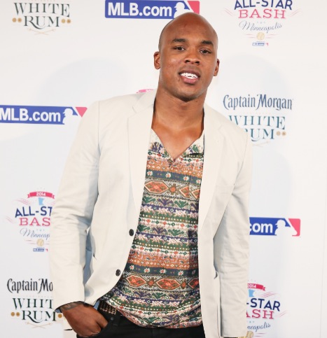 NFL player Jermichael Finley walks the red carpet at the Captain Morgan White Rum and MLB.com All-Star Bash at Epic Entertainment on July 13, 2014 in Minneapolis, Minnesota.  (Photo by Tasos Katopodis/Getty Images for Captain Morgan)